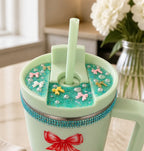 BOW 40 oz stainless steel tumbler with charm and decorated lid